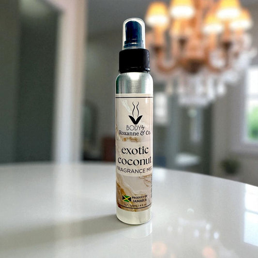 Exotic coconut fragrance mist bottle on a surface with a blurred background