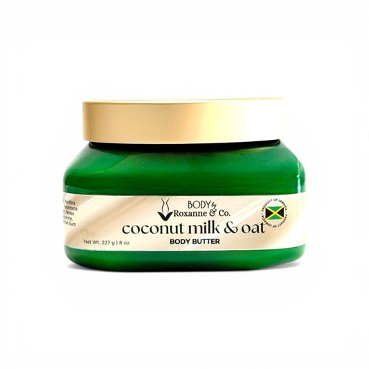 Jar of coconut milk and oat body butter with a gold lid on a white background