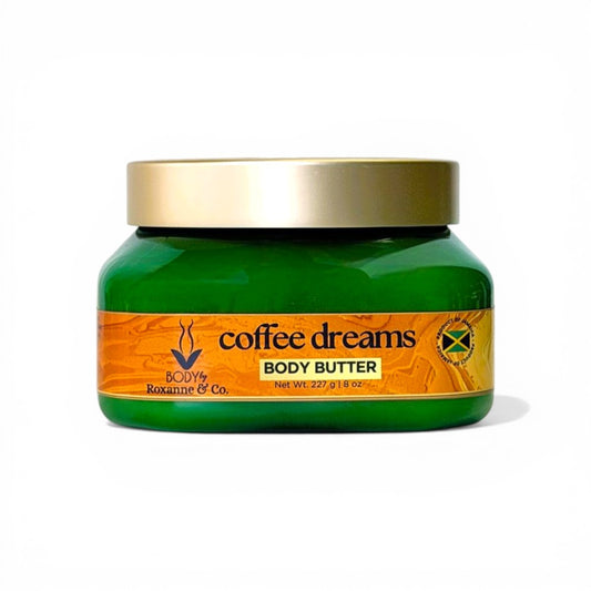 Green jar of 'Coffee Dreams' body butter with gold lid on a white background