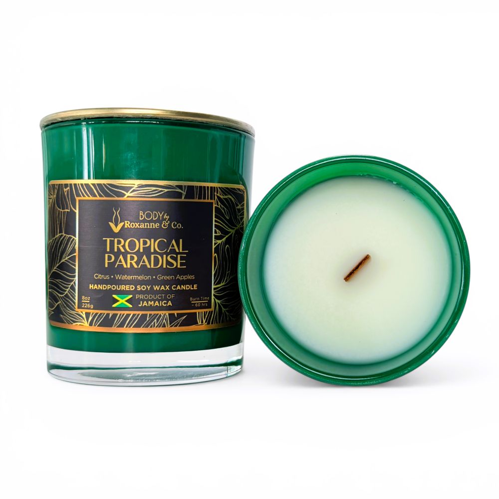 Tropical Paradise candle with green packaging on a white background