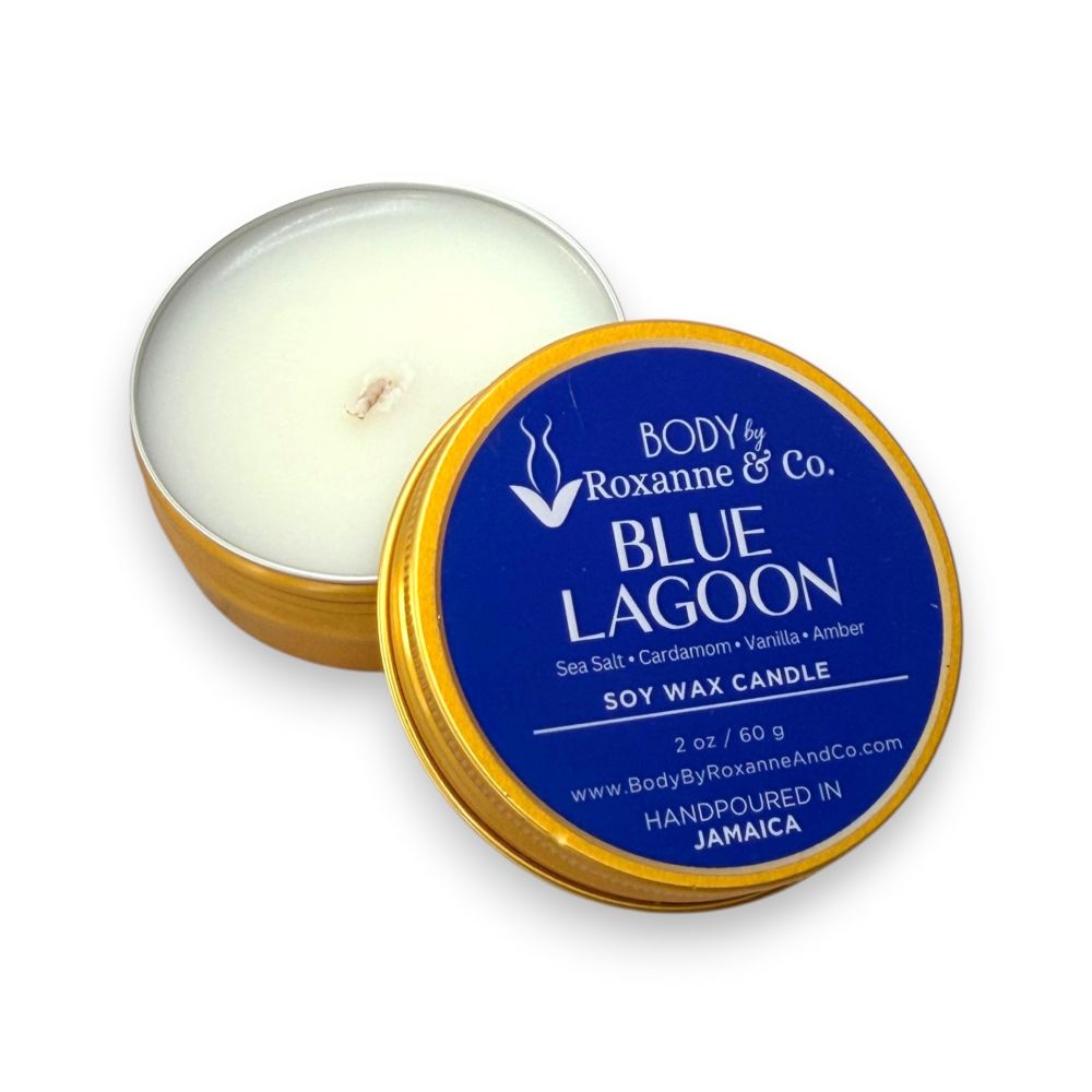Soy wax candle in a tin with a blue label on a white background