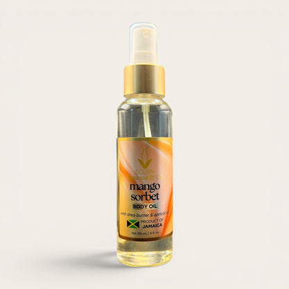 Bottle of mango sorbet body oil on a light gray background