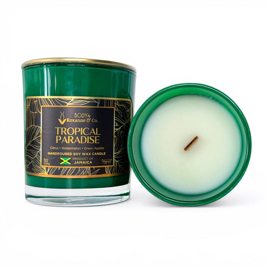 Tropical Paradise candle with green packaging on a white background