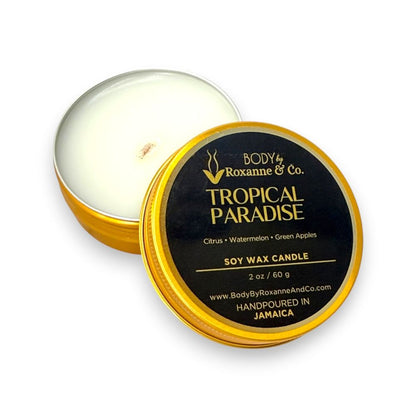 Tropical Paradise candle with gold lid on a white background