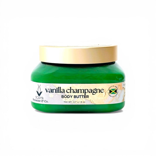 Green jar of vanilla champagne body butter with gold lid on a white background