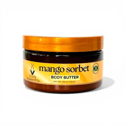 Jar of mango sorbet body butter with a gold lid on a white background